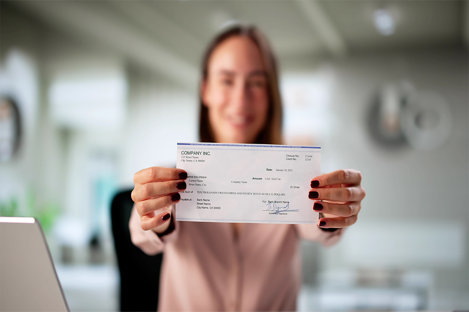 Smiling Woman Manages Financial Documents